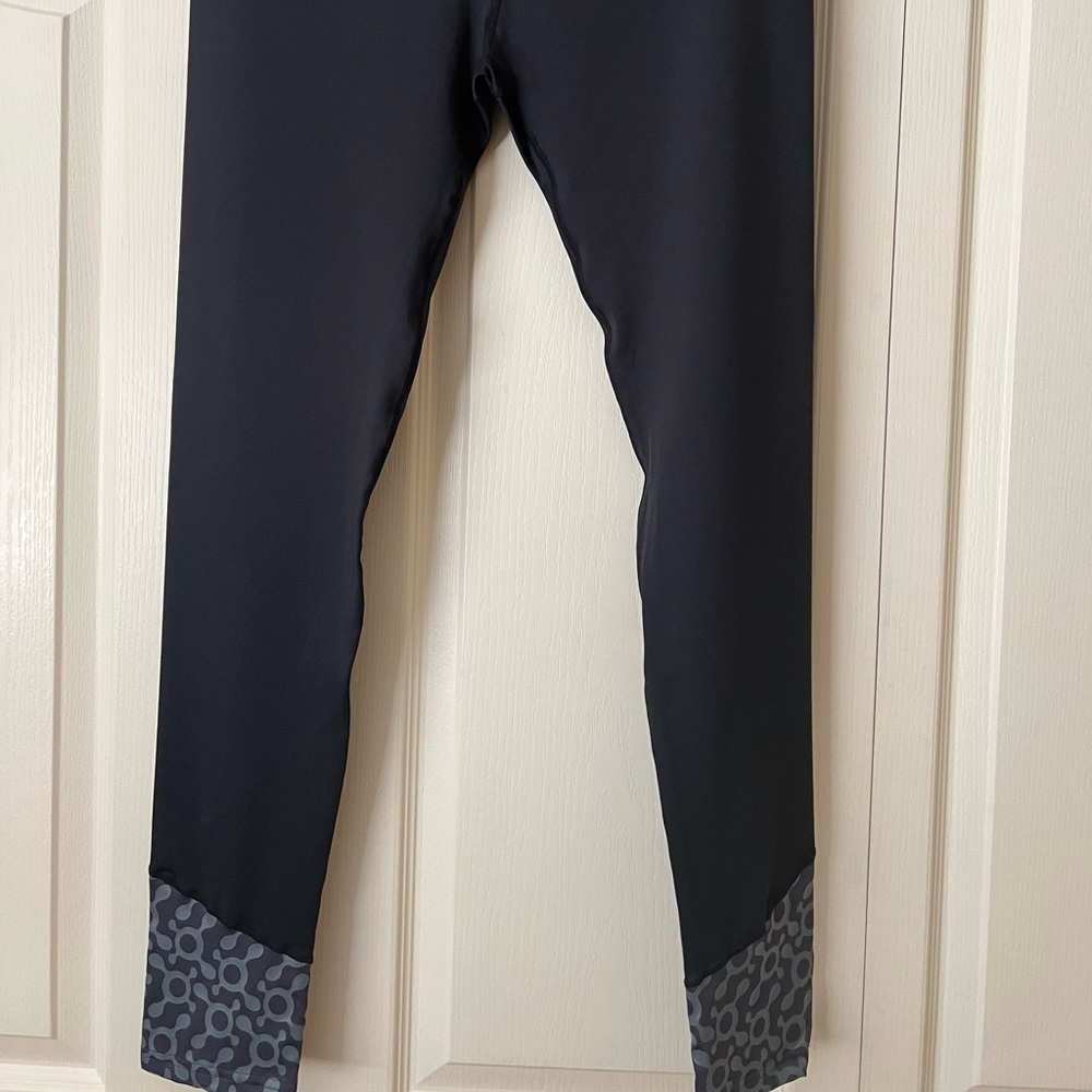 Orangetheory Lovers!!  NWOT Black OTF leggings Size XL. A must have.